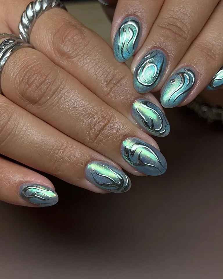 9 K-Pop-Inspired Summer Nail Trends for 2025 14 Iridescent Optics