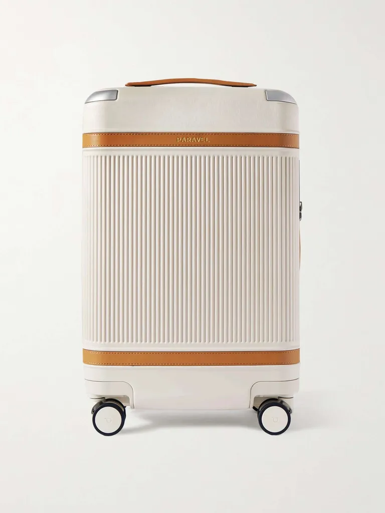 The Viral Airport Outfit Everyone's Wearing—Inspired by '90s Fashion Icons Style 10 Aviator Carry-On Vegan Leather-Trimmed Hardshell Suitcase